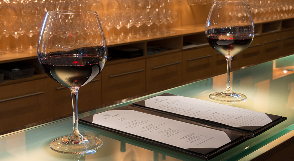 Tolosa 1772 Flight Menu and Wine Glasses in Tasting Room