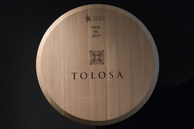 Tolosa logo on barrel paneling