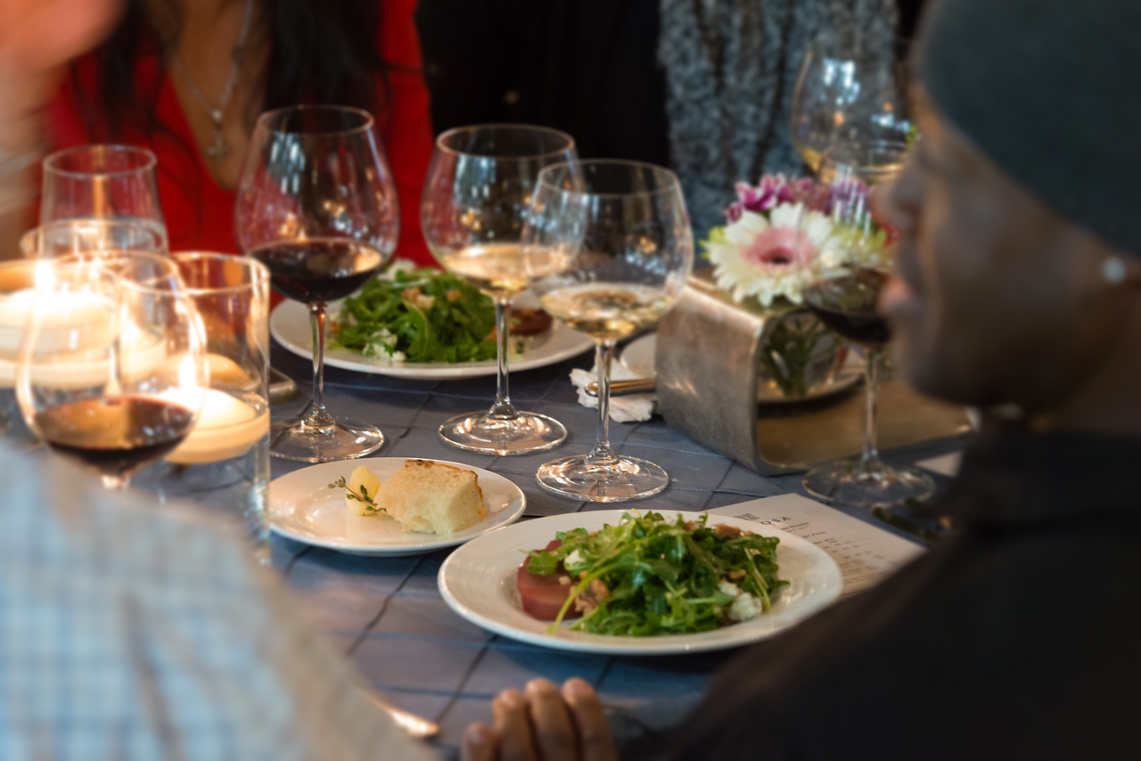A dinner setting at one of Tolosa's wine club member events.