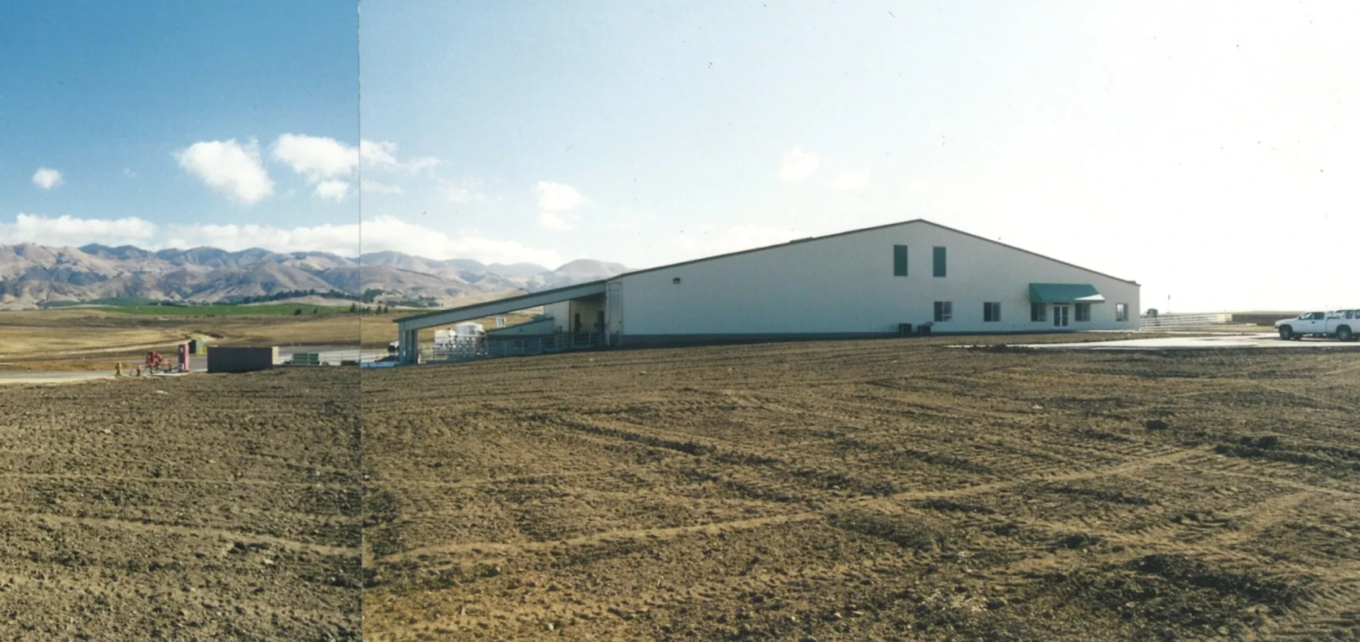 A panoramic view of the winery and the surrounding mountains