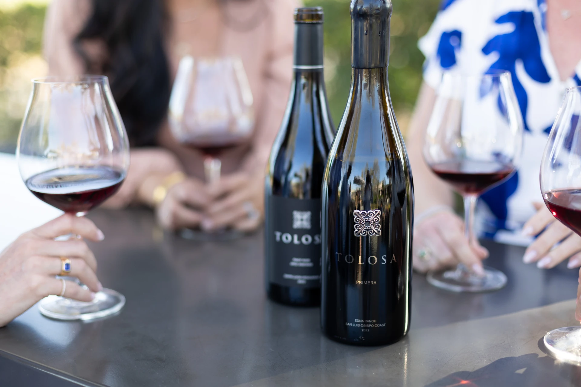 A group enjoying a glass of wine together