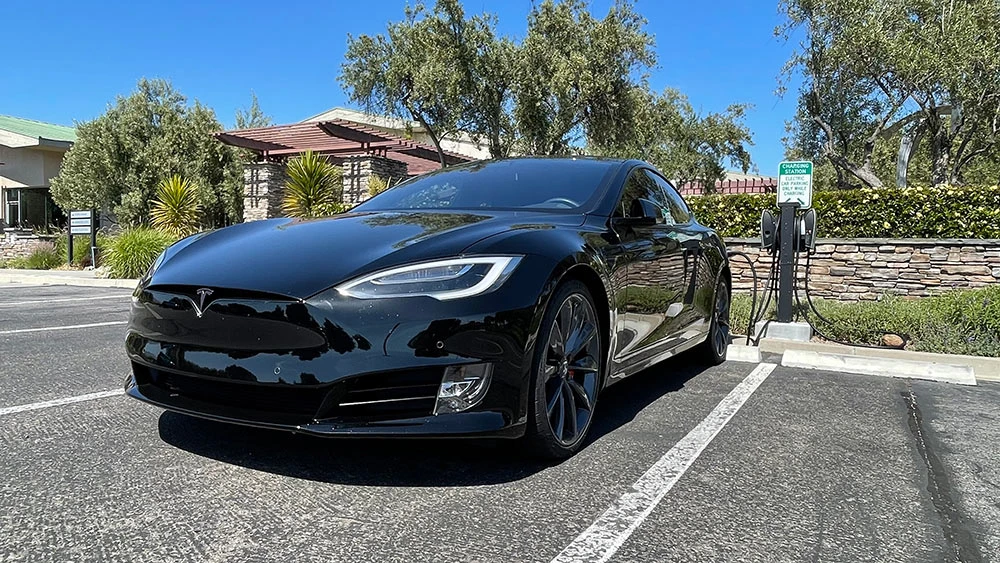 An electric car charging in the Tolosa Winery car park